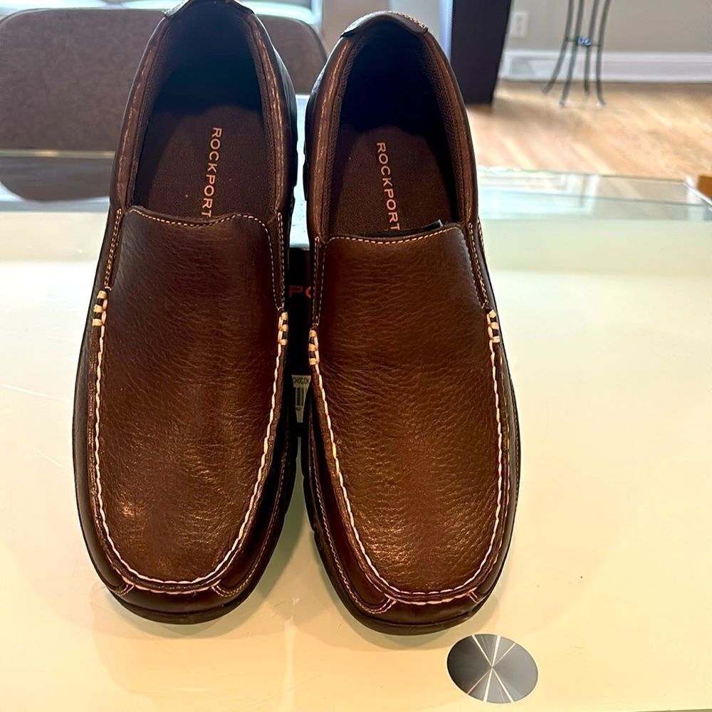 Rockport new loafers chocolate brown 9 scratches on top of right shoe see pictur
